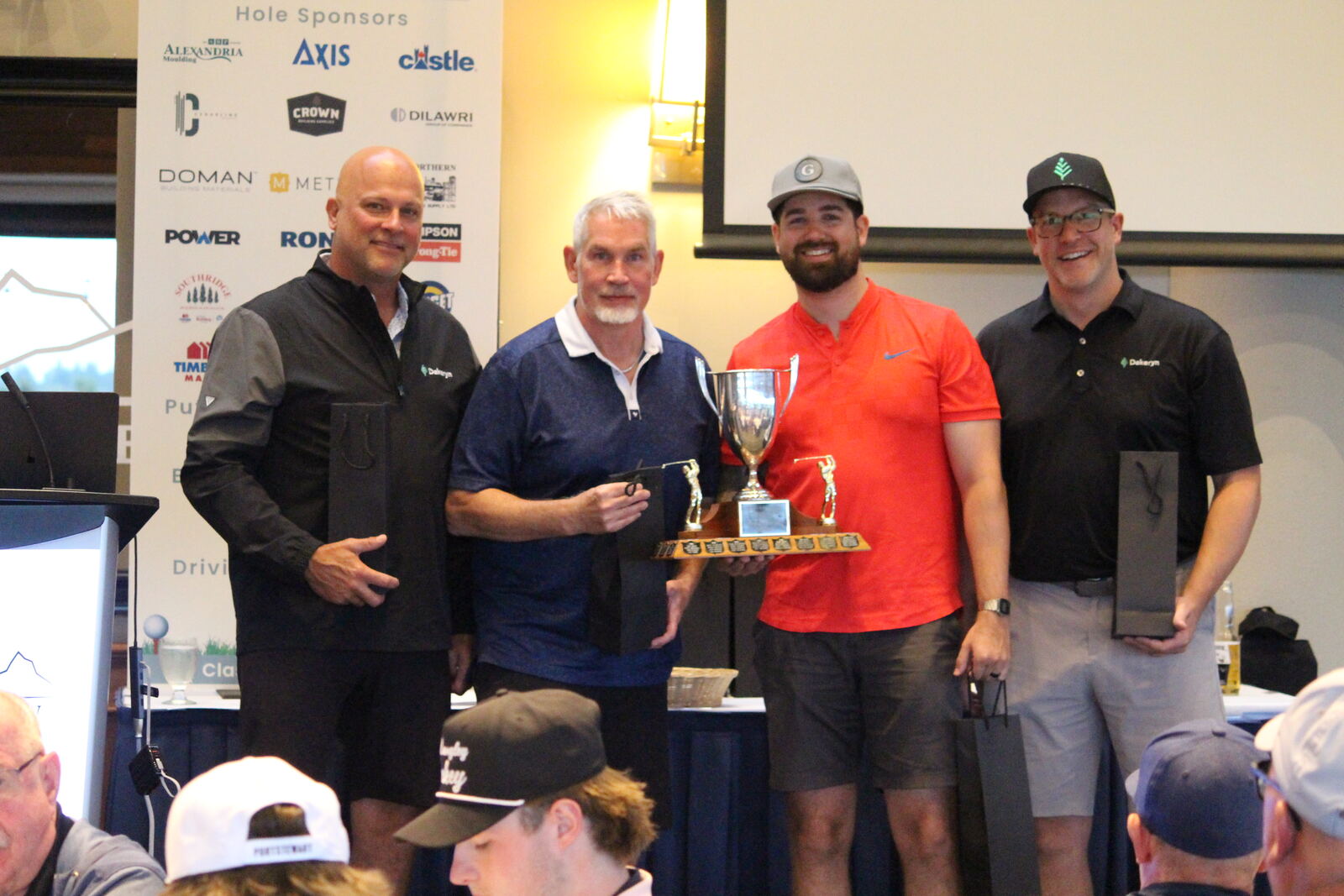 The winning foursome accepting the Lower Mainland Classic trophy at the awards dinner